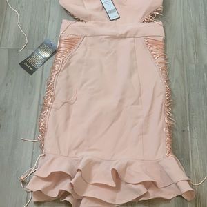 Nwt never worn. Beautiful dress for party 🎉. Side Lacing Dress